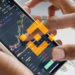 Binance limits daily withdrawals to $2,000 for basic accounts amid regulatory woes