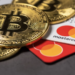 Mastercard has announced a partnership with a web3 technology company Immersive, to offer an all-new crypto-enabled method of payment for physical, digital and metaverse purchases. Mastercard Supports Stablecoin Transactions In Collaboration With Immersive Immersive, the web3 company behind this partnership, has said that this new payment solution will enable users to make digital currency payments directly from their crypto wallets. And can be used to pay for all goods and services at merchants that support Mastercard. This new solution is exclusive and launched for consumers in New Zealand and Australia. There is no third party required by the system that holds funds as collateral, which means users will have complete control over their cryptocurrencies. The ownership of assets will completely be in the hands of a customer until they make a purchase. And USD Coin will be used for all purchases through Mastercard. USD Coin is a cryptocurrency stablecoin from Circle, a technology company in the US, and is pegged 1:1 to the US dollar. Every time a payment is made, the stablecoin will be converted to fiat, and the transaction will be settled on Mastercard’s network. Immersive has revealed that the company will rely on Mastercard’s identity services and CipherTrace solution to address Know Your Customer (KYC) and Anti-Money Laundering (AML). In addition to this, the company will also lean on online fraud detection and blockchain analytics to secure the transaction process. Sandeep Malhotra, Vice President of Products & Innovation at Mastercard further commented about this collaboration saying, “As Web2 and Web3 increasingly converge, Mastercard remains committed to partnering with like-minded organizations like Immersve to scale and secure the blockchain ecosystem to make simple, safe cryptocurrency transactions, and even payments in the metaverse, easily accessible to billions of consumers.” Jerome Faury, CEO at Immersive, too, commented on the partnership saying “Collaborating with a well-known and trusted brand like Mastercard is a big step towards mainstream adoption of web3 wallets,” “We love the fact that our platform supports both centralized crypto payments and decentralized experiences, to enable individuals to become the master of their money. Immersive is literally building bridges that make it possible for individuals to transact directly from their crypto wallet, anywhere Mastercard is accepted online. We want to bring the best of web3’s technology and values to everyday payment experiences. But we also want to provide traditional guardrails, like the Mastercard network’s consumer protections, to crypto natives transacting online.” he further added. Mastercard Expands Services To Cryptocurrency Issuers This isn’t the first time Mastercard has offered a cryptocurrency-related solution. The company has been constantly trying to ensure that cryptocurrency services reach as many people as possible. Mastercard conducted a study in 2022, that showed 49% of Brazilian consumers have made at least one cryptocurrency transaction in their life in the past 12 months, while the global share for the same category stands at 41%, significantly lower than that of Brazil. The payments company collaborated with Binance, a popular cryptocurrency exchange, to launch a card that will enable Brazilians to make payments with 13 cryptocurrencies, including Bitcoin and Binance USD. Binance said that it will offer cashback of up to 8% on purchases made with the card, and won’t charge any fee for ATM withdrawals. However, the company will charge a fee of 0.9% for every transaction made with the card. Mastercard has also collaborated with banks and fintechs to support buying, holding and selling crypto assets. The company has also helped banks offer cross-border crypto-related services, in addition to digital receipt and loyalty solutions to financial institutions. Jorn Lambert, Mastercard’s digital director comments on the importance of convenient crypto solutions in a CNBC interview saying, “There are many consumers who are really interested and intrigued by cryptocurrency, but who would feel much more confident if these services were offered by their financial institutions “It’s still a little scary for some people.” Digital Asset Adoption Demands Cryptocurrency Support From Traditional Payments Providers. Mastercard has been continuously making efforts to bring cryptocurrencies onto its platform, but it has been clear that the company doesn’t want to promote cryptocurrencies but provide users with alternatives for payments. An official newsroom release from the company read, “Our philosophy on cryptocurrencies is straightforward: It’s about choice. Mastercard isn’t here to recommend you start using cryptocurrencies. But we are here to enable customers, merchants and businesses to move digital value – traditional or crypto – however they want. It should be your choice, it’s your money.” Mastercard has partnered with Paxos, Circle, Evolve and a bunch of other leading cryptocurrency companies to find ways of converting cryptocurrencies into fiat for payments. This will create an infrastructure for cryptocurrencies in the traditional ecosystem that can support future cryptocurrency partnerships. The company also plans to diversify the method of payments for users onto its platform, while ensuring customer protection and maintaining regulatory compliance. Mastercard already offers a range of services such as digital identification, cybersecurity, consulting and open banking services to thousands of financial institutions. It intends to use these resources to provide better support to cryptocurrency companies. To expand the company’s consulting activity, Mastercard purchased CipherTrace, a company that tracks fraudulent behavior in crypto transactions and opens them up for investigation. This will help the company to make crypto-related transactions on the network more secure for consumers, in addition to helping it comply with regulators.